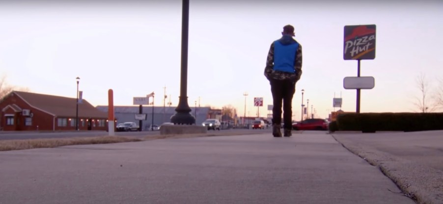 Bill Moczulewski walks to work through Cabot Arkansas