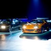 Dodge Charger and Toyota Supra staging a Fast and Furious drag race