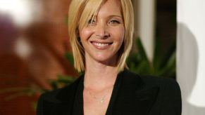 Lisa Kudrow smiles at an event.