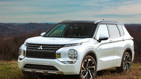 A white 2024 Mitsubishi Outlander PHEV