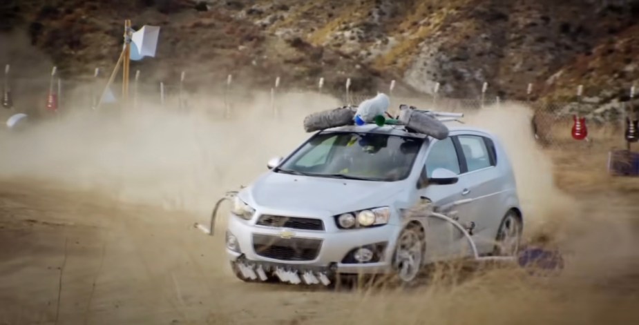 OK Go driving a Chevrolet Sonic through the desert for the band's Needing/Getting music video.