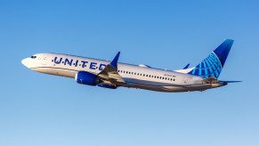 A United Airlines Boeing 737 MAX 8 cruises in the air.