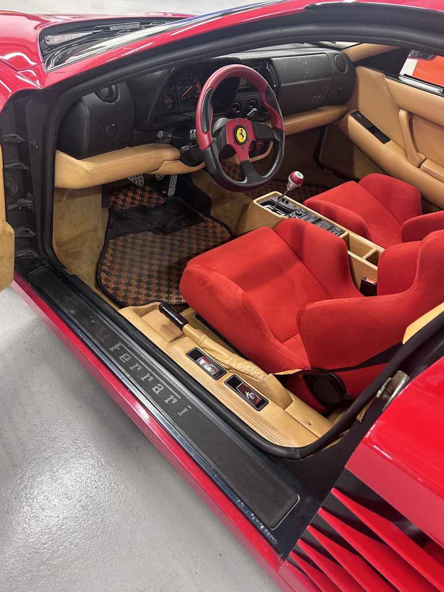 Gerhard Berger's Ferrari F512M, stolen in 1995, interior view red and tan colors left front angle