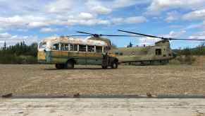 "Into the Wild" Bus 142 a 1946 International Harvester is shown parked in a clearing after being airlifted out of the Alaskan bush by a national guard helicopter