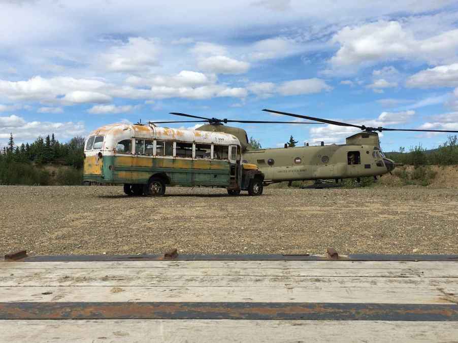 "Into the Wild" Bus 142 a 1946 International Harvester is shown parked in a clearing after being airlifted out of the Alaskan bush by a national guard helicopter