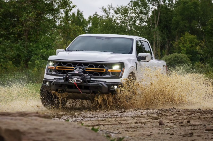 The 2024 Ford F-150 kicking up mud