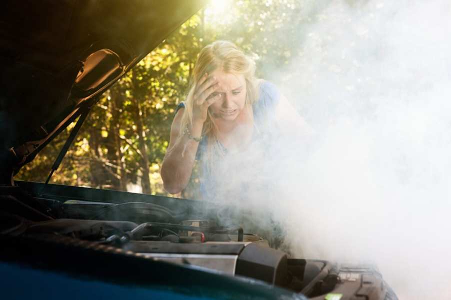 A smoking car due to a coolant leak