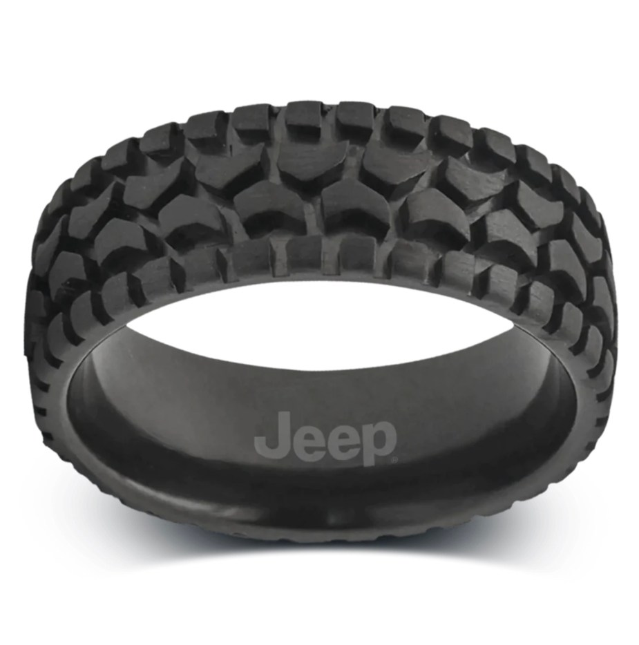 A black ring shaped like a rubber off-roading tire tread.