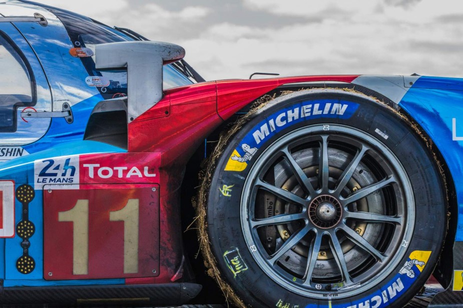 The Michelin logo on the tire of a 24 Hours of Le Mans race car