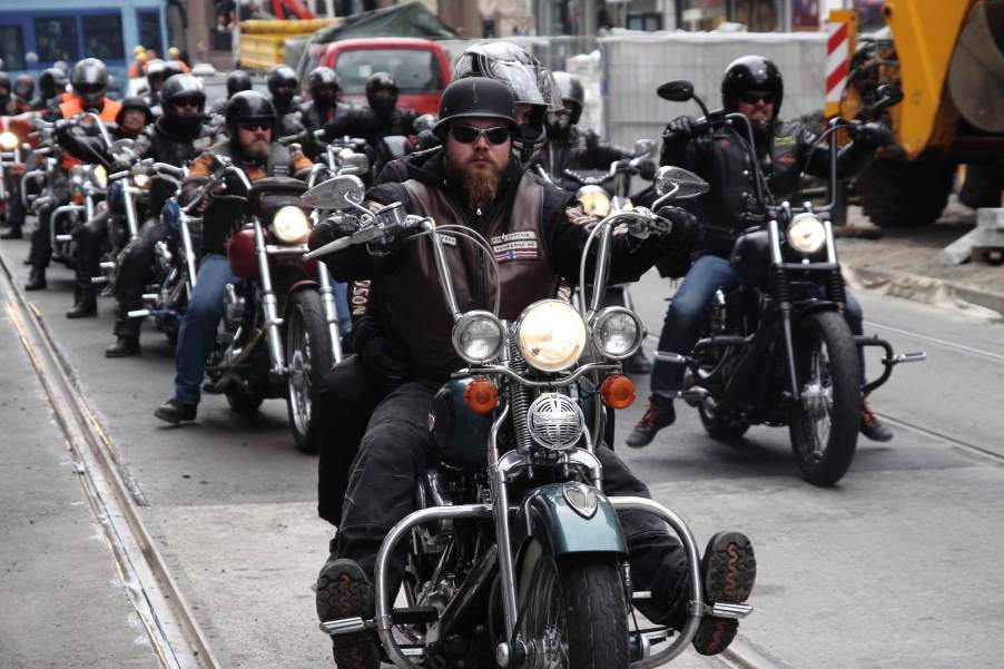 Group of bikers from multiple outlaw motorcycle clubs ride in a protest together