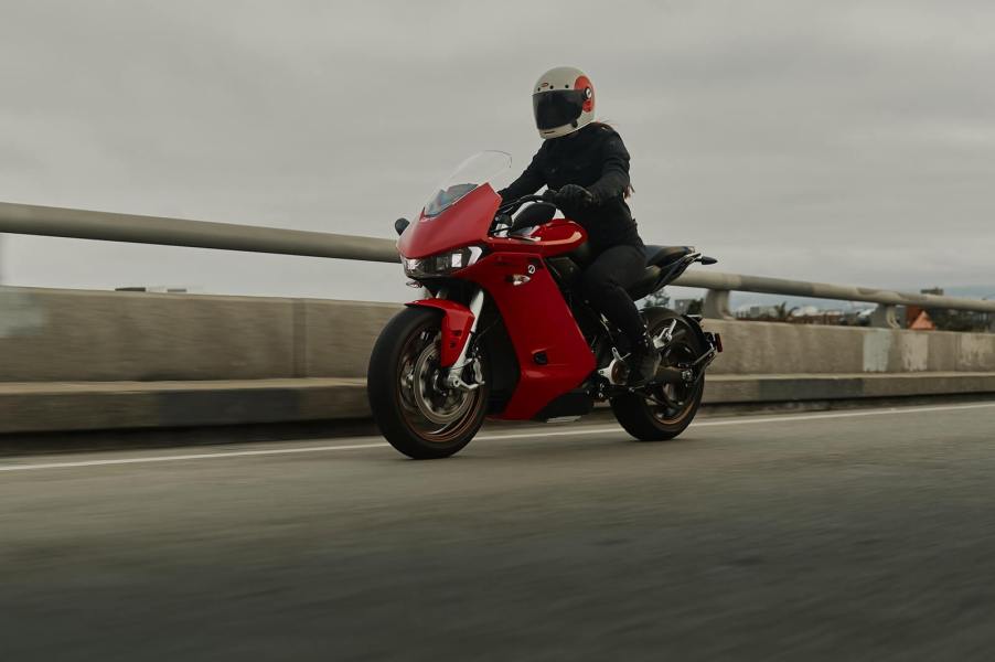 A rider cruises on a Zero SR/S electric motorcycle.