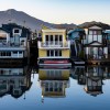 Houseboats floating in a Sausalito, San Francisco Bay Area marina