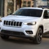 The 2023 Jeep Cherokee driving on the road