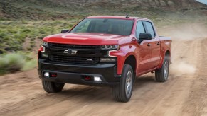 The 2024 Chevy Silverado on a dirt road