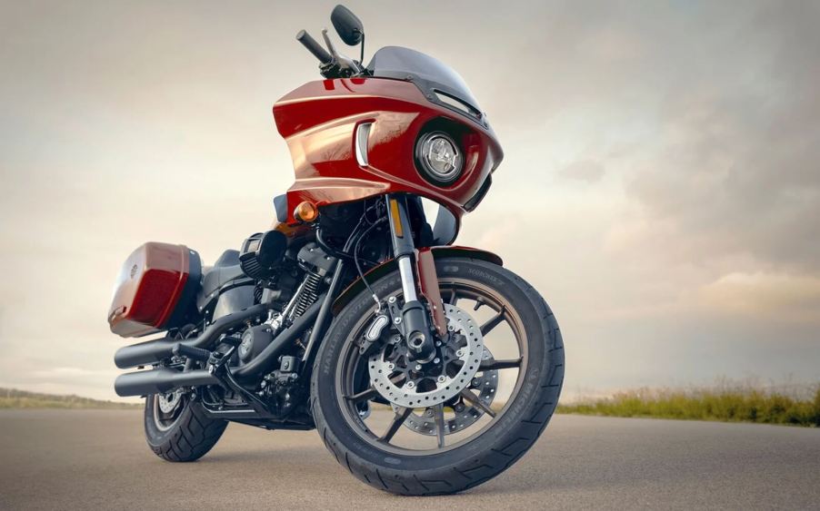 A red 2024 Harley-Davidson Low Rider ST shows off its clam shell fairing.