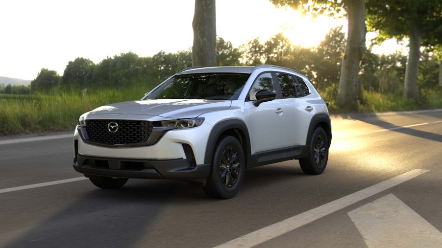 The 2024 Mazda CX-50 driving on the road