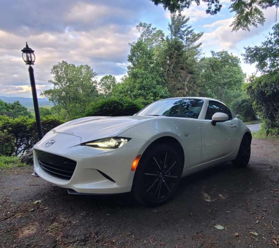 The 2024 Mazda MX-5 Miata parked at dusk