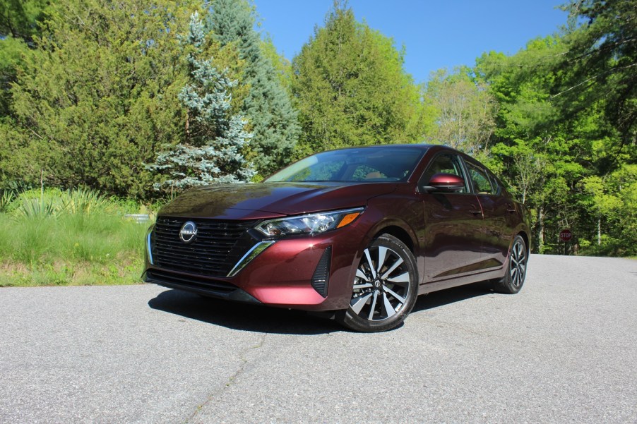 The 2024 Nissan Sentra parked near foliage