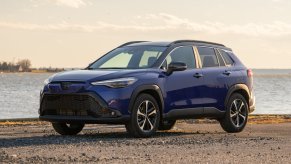 The 2024 Toyota Corolla Cross Hybrid parked on the beach