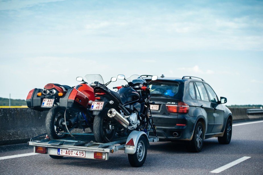 Towing a trailer full of motorcycles with a BMW X5 crossover SUV