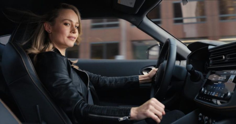 Actor Brie Larson smiles in a Nissan advertisement.