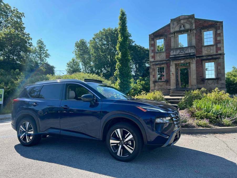 A blue 2024 Nissan Rogue crossover SUV in Louisville, Kentucky.