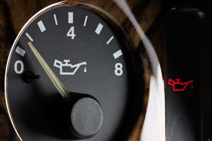 A low oil pressure gauge in a car's dashboard