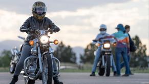 Students learn to ride a motorcycle on the road course.