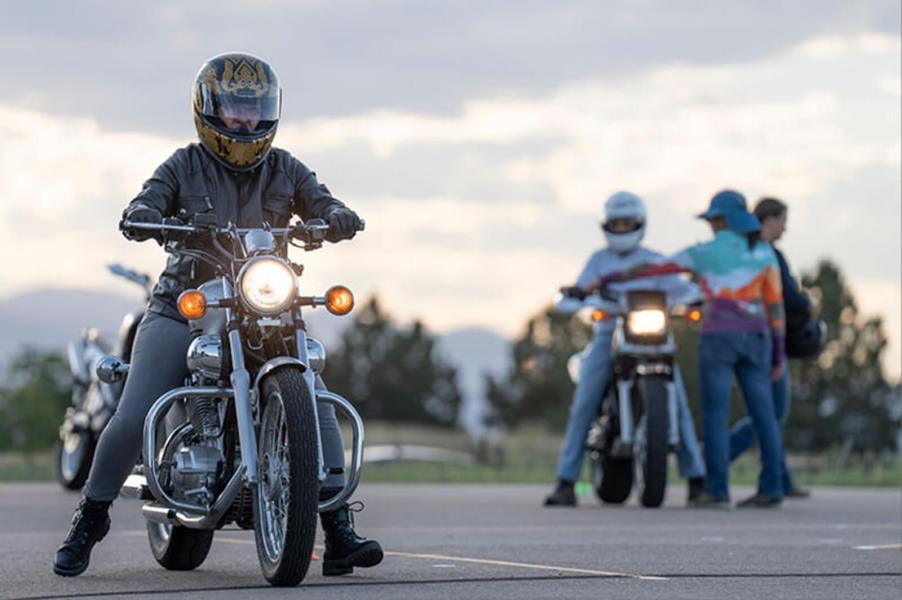 Students learn to ride a motorcycle on the road course.