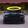 A widebody Dodge Challenger SRT model shows off its fascia, spacious interior, and a halo.