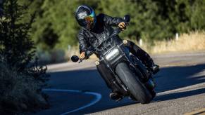 A rider on a Harley-Davidson Sportster S with a new NEOTEC II full-face motorcycle helmet