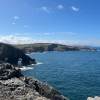 A vista off the road on the North Coast 500 is accessible by driving in Scotland.