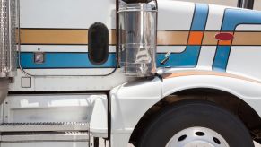 The blindspot door in the passenger side floor of a semi truck.