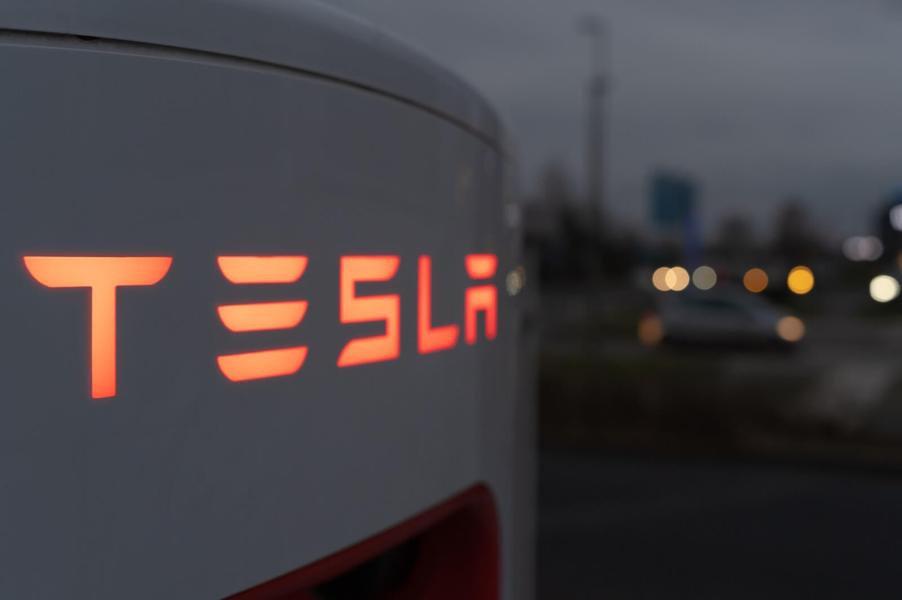 A Tesla charging station's job is to charge EVs.