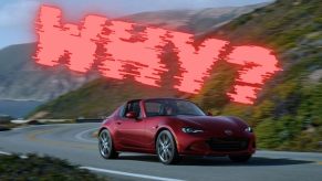 A 2024 Mazda MX-5 Miata cruises around a corner under a graphic.