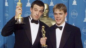 Ben Affleck and Mat Damon holding their Oscars after writing and starring in "Good Will Hunting" 1998