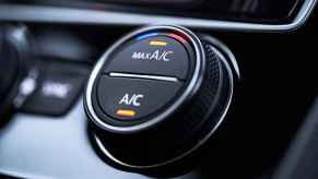 Car A/C control knob with "MAX A/C" and "A/C" buttons