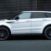 A white 2015 Range Rover Evoque parked in full left profile view