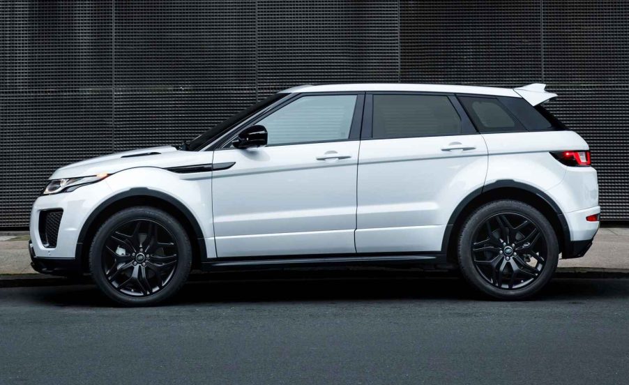 A white 2015 Range Rover Evoque parked in full left profile view