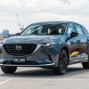 The 2023 Mazda CX-9 parked near the water