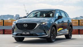 The 2023 Mazda CX-9 parked near the water