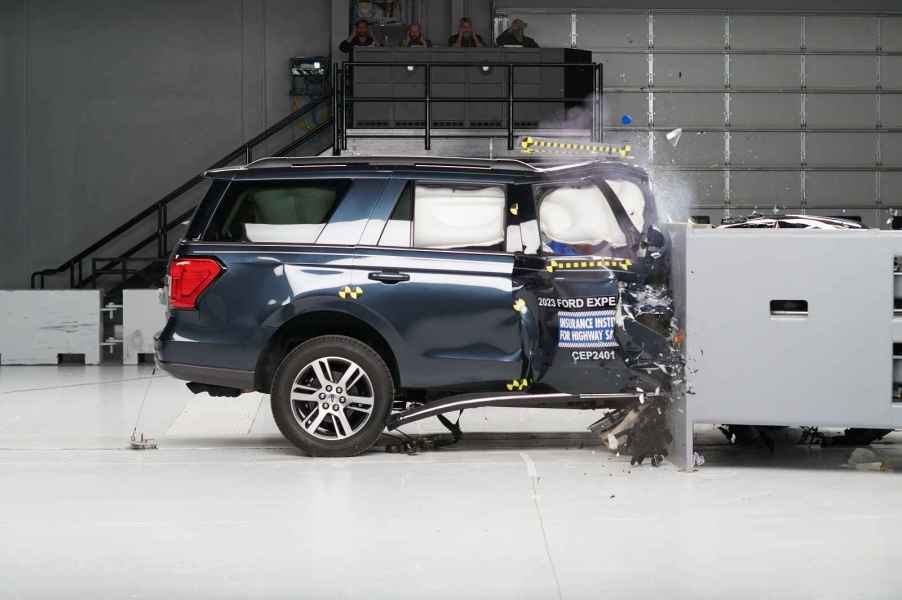 Dark blue 2023 Ford Expedition SUV during the passenger front overlap crash test