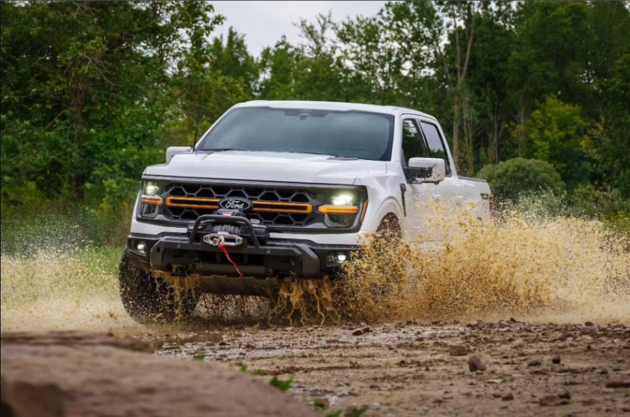 The 2024 Ford F-150 kicking up mud