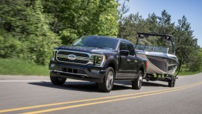 The 2024 Ford F-150 Hybrid towing a boat