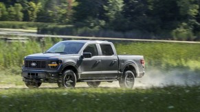 The 2024 Ford F-150 on a dirt road