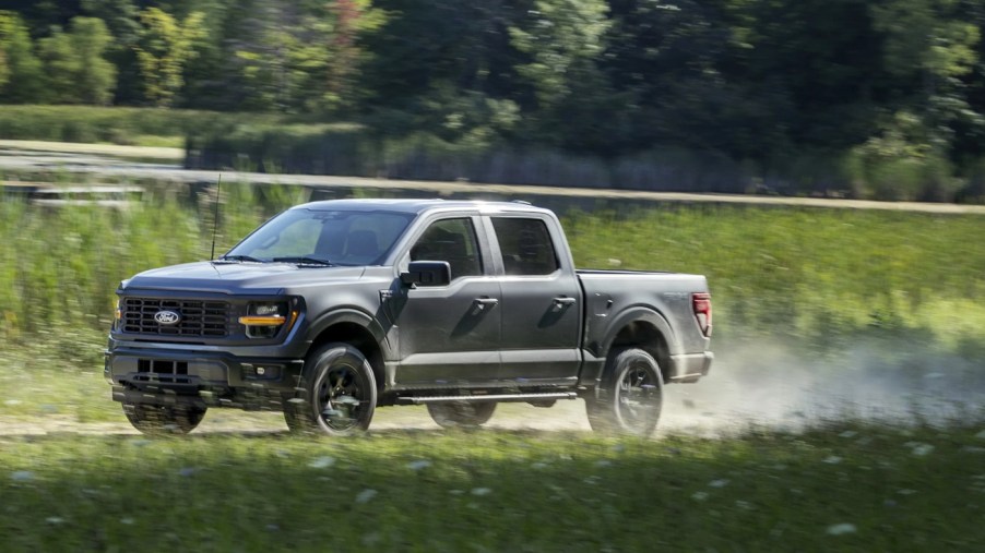 The 2024 Ford F-150 on a dirt road