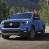 The 2024 Honda Ridgeline on a dirt road