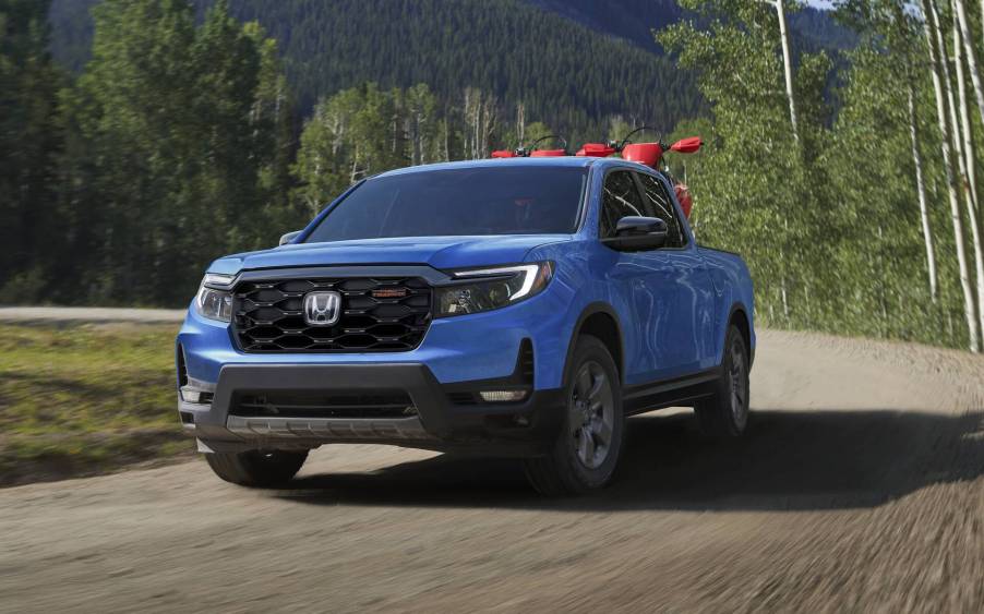 The 2024 Honda Ridgeline on a dirt road