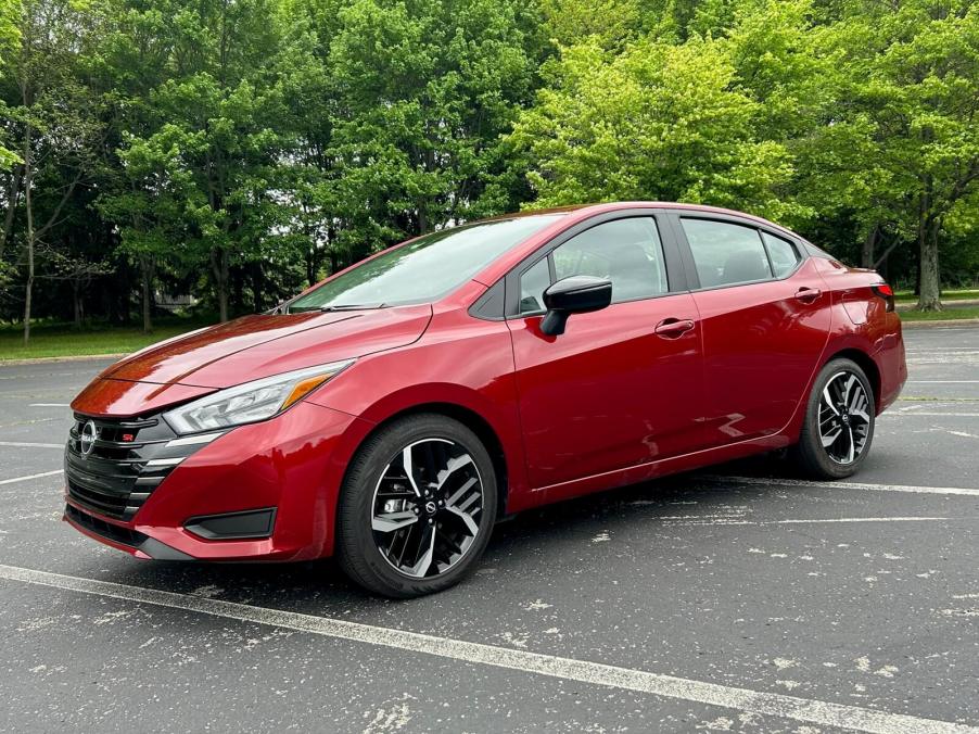 A 2024 Nissan Versa SR in a park.