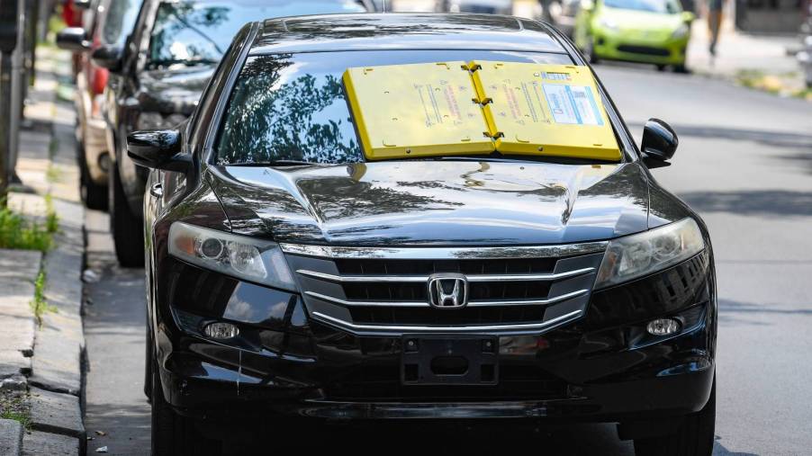 Everyone knows about the car boot but some cities are adopting the parking barnacle or windshield boot